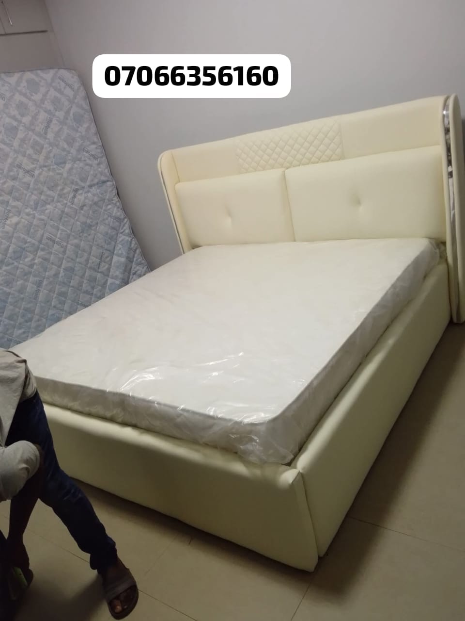 Cream leather upholstered bed frame