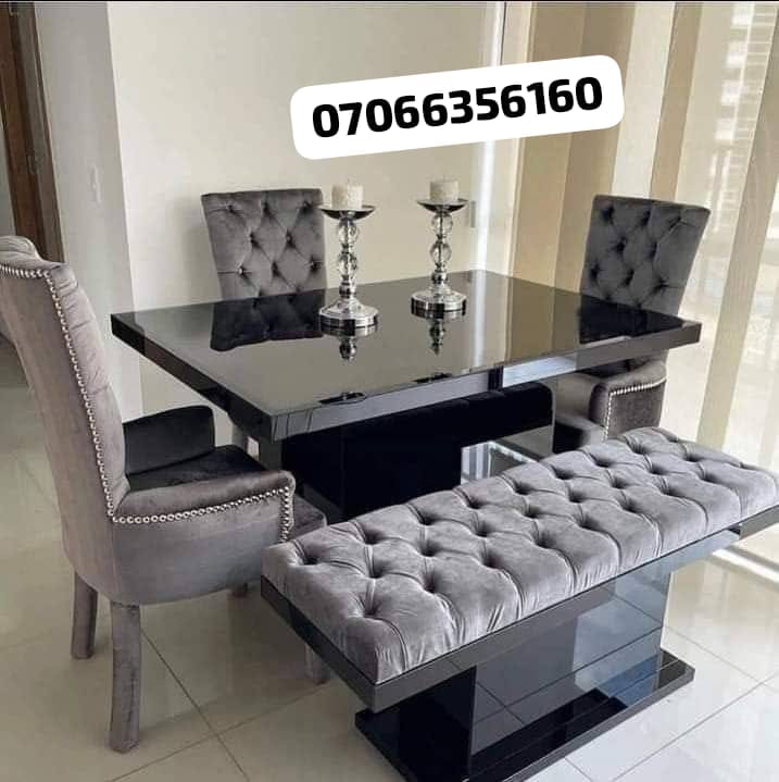Grey velvet studded dining set with black glass table and bench