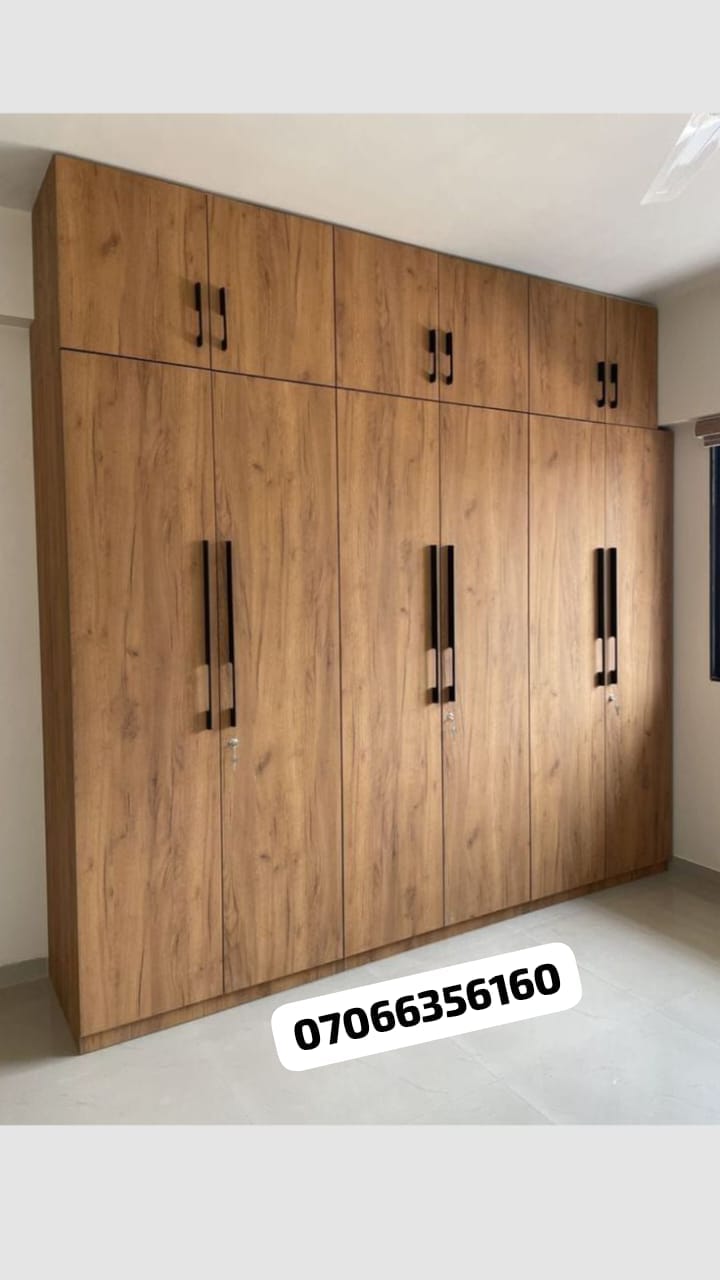 Walnut wood-finish tallboy wardrobe