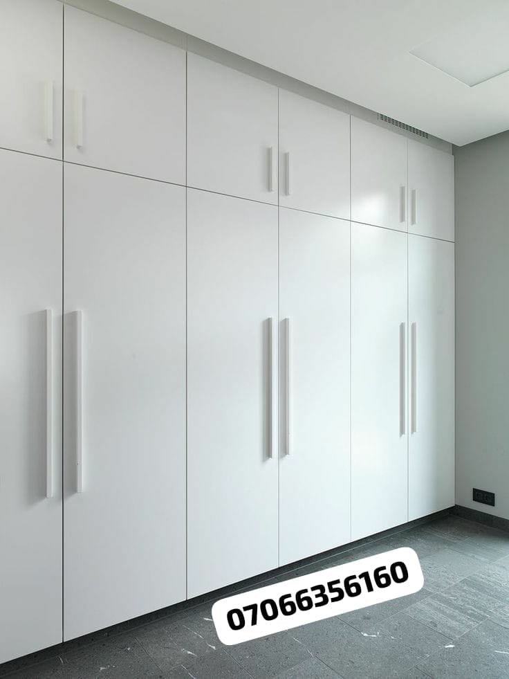 White gloss fitted wardrobe